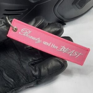 beauty and her beast lady biker key tag