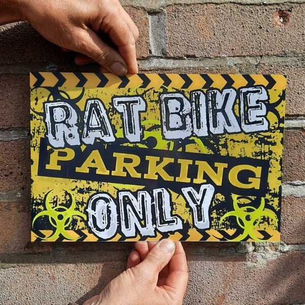 black and yellow hazard parking sign ratryder