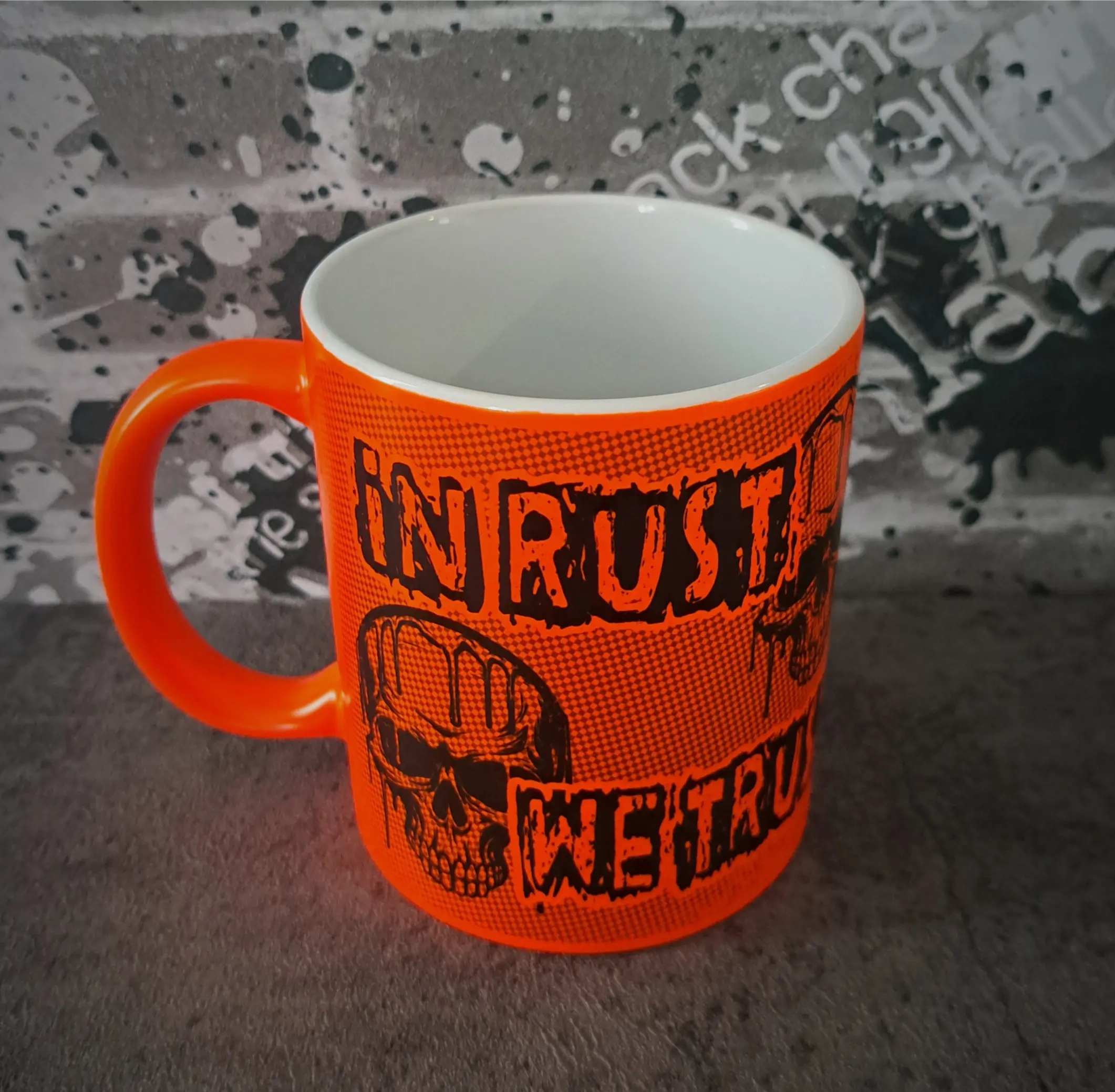 In Rust we Trust Mug - Fluorescent Orange Skull Mug 3 Top-down view of In Rust We Trust mug showing white interior lining and bright orange handle
