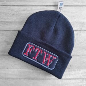FTW embroidered unisex biker beanie on wooden background