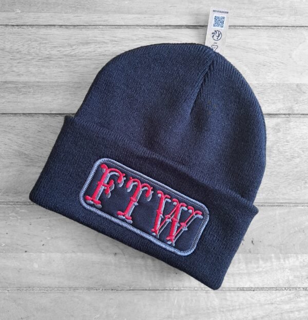 FTW embroidered unisex biker beanie on wooden background