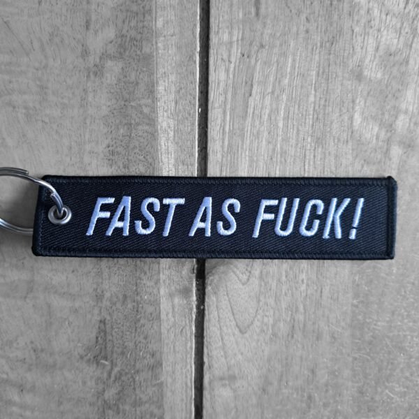 Front view of Fast As F*ck embroidered biker keytag