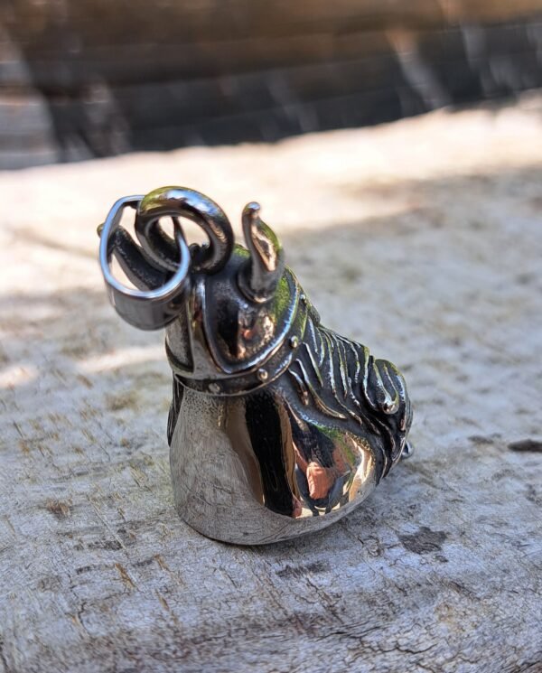 Side angle of Viking skull guardian bell keychain in stainless steel