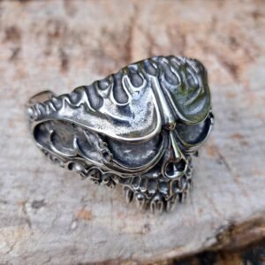 Biker and gothic stainless steel skull bangle with flame design, heavy metal style, 69mm inside diameter.