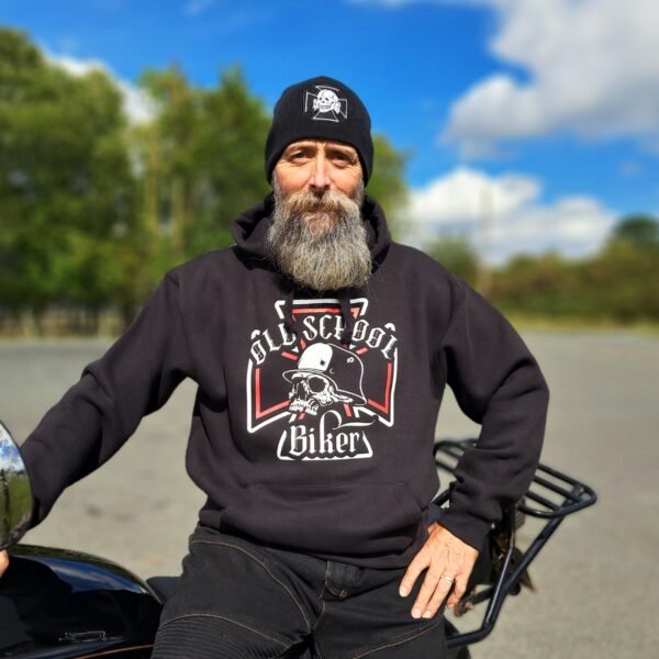Front view of black hoodie featuring the Old School Biker design with helmeted skull over a cross motif.