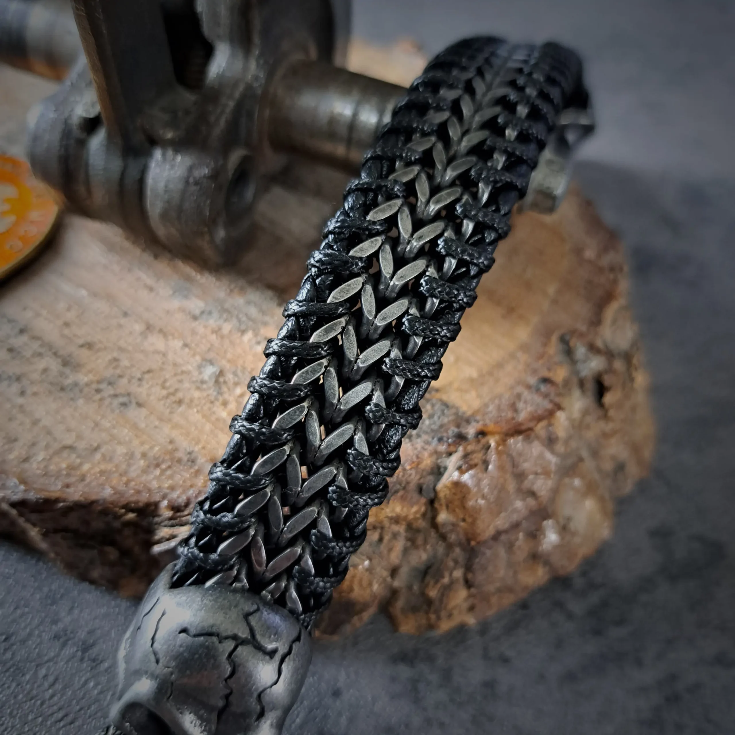 Men's Heavy Stainless Steel Skull and Leather Bracelet | 95g, 20mm Snap Ring 6 Spine view of 20mm woven steel spiga chain and black cord biker cuff
