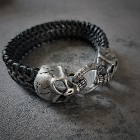 Mens heavy stainless steel skull and leather bracelet with 20mm woven band and snap ring