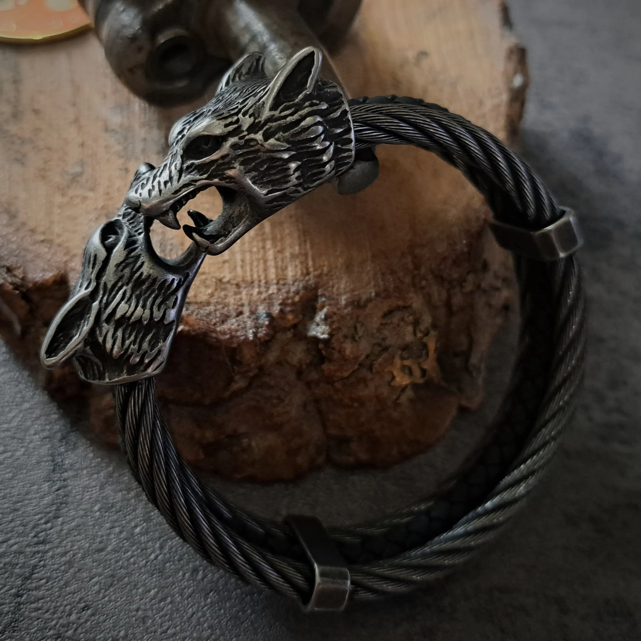 Men's Heavy Stainless Steel Wolf Head Bracelet | 133g, 22mm 2 Close up of 22mm snarling wolf head on mens steel and leather wolf bracelet