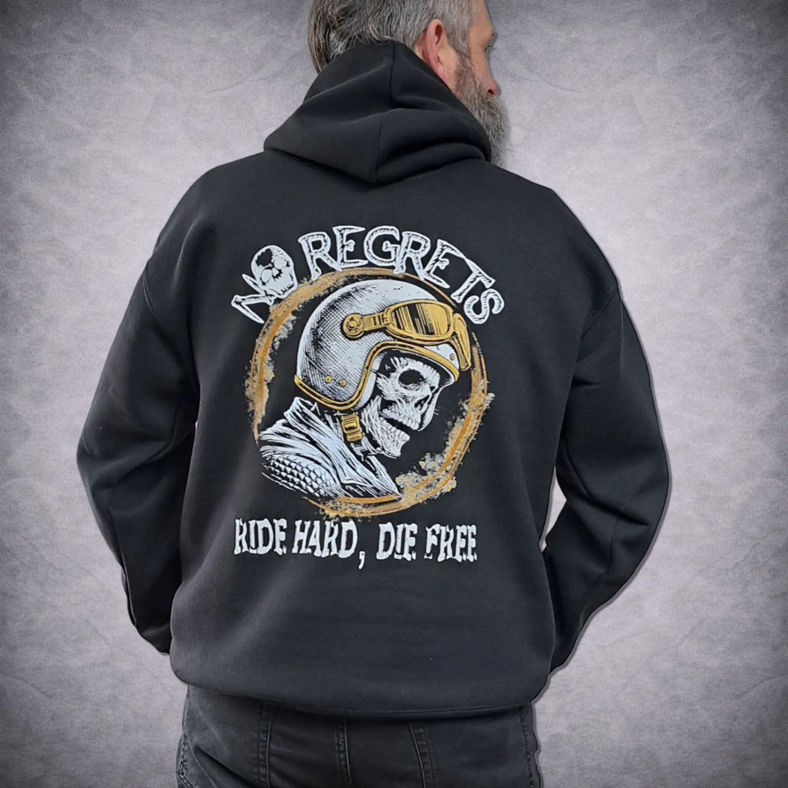 Skull Biker Hoodie – Ride Hard Die Free “No Regrets” Motorcycle Hoodie 6 No Regrets Ride Hard Die Free biker hoodie showcasing the full graphic back print of a skull wearing a vintage motorcycle helmet.