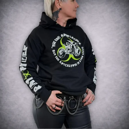 Apocalypse biker hoodie showing the lime green biohazard motorcycle front graphic and sleeve prints on a model.