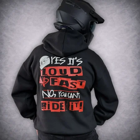 Back of the black No You Can't Ride It funny biker hoodie worn by a model wearing a matte black motorcycle helmet.
