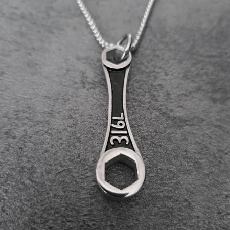 Solid 316L stainless steel ring spanner wrench biker pendant front view
