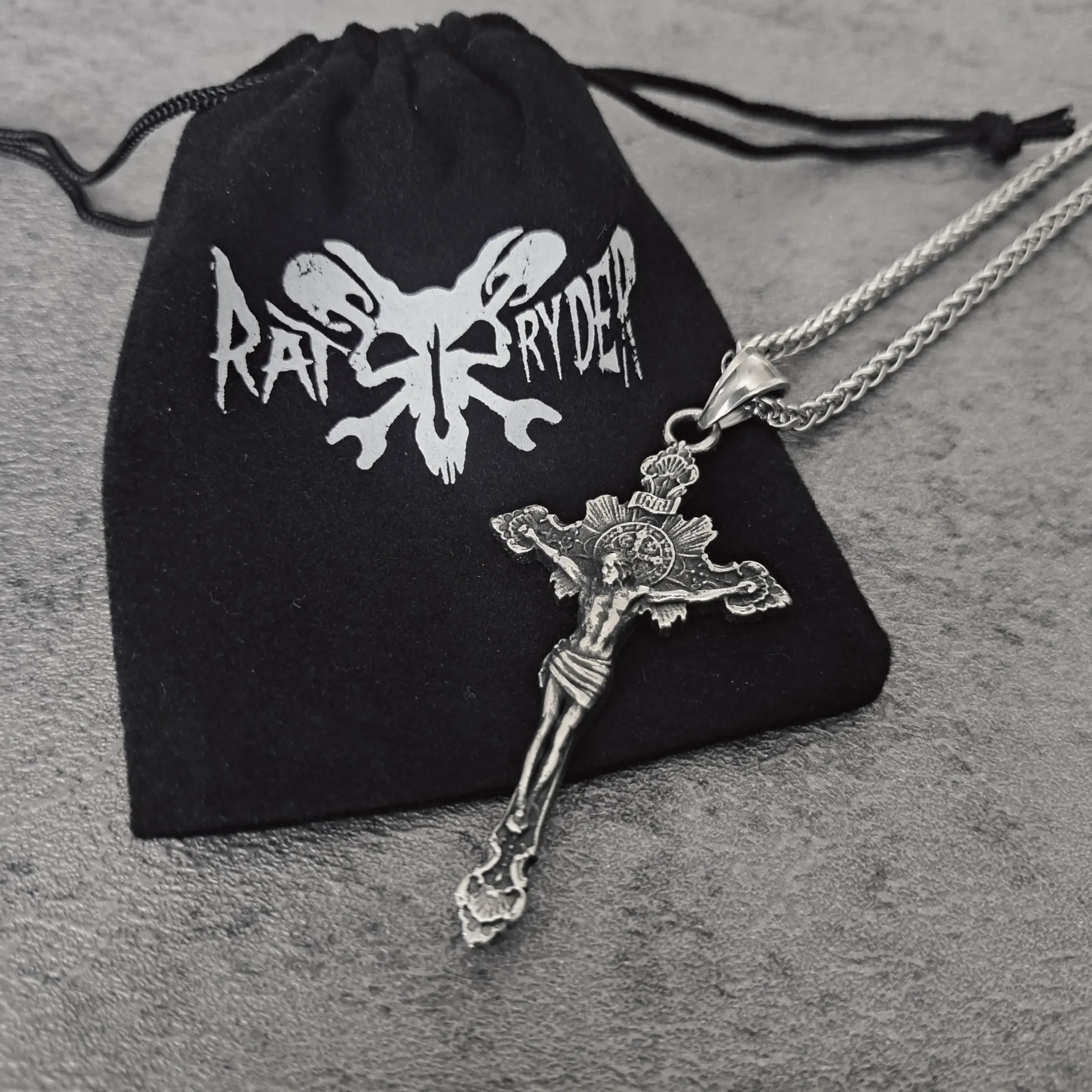Dark Grace Crucifix Cross – 316L Stainless Steel Biker Pendant | RatRyder 3 Solid 316L stainless steel dark grace crucifix biker pendant on black RatRyder gift pouch