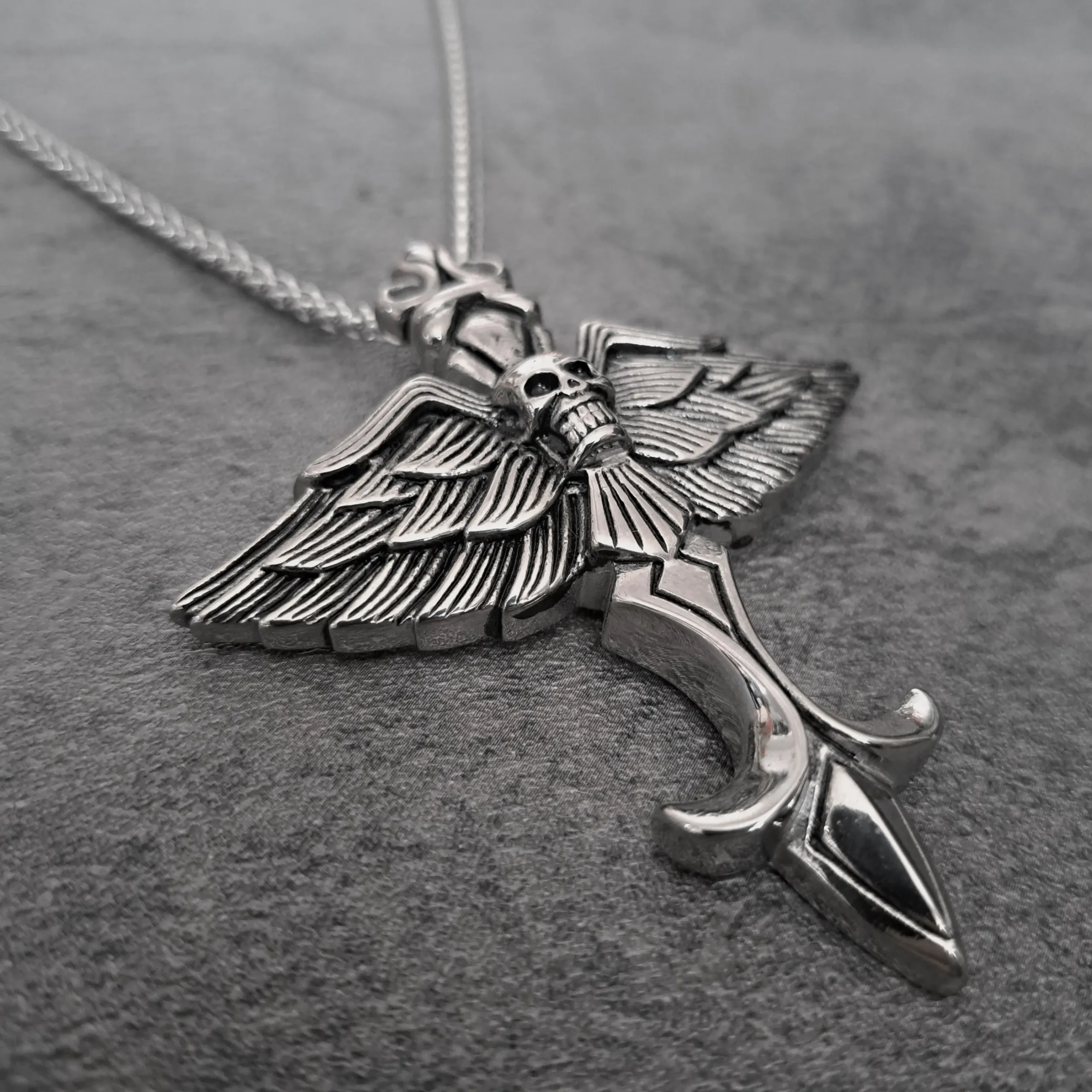Shadow Wing Skull Cross Biker Pendant – Large Solid 316L Stainless Steel Necklace | RatRyder 2 Angled close-up of heavy-duty large stainless steel biker jewellery winged skull cross pendant