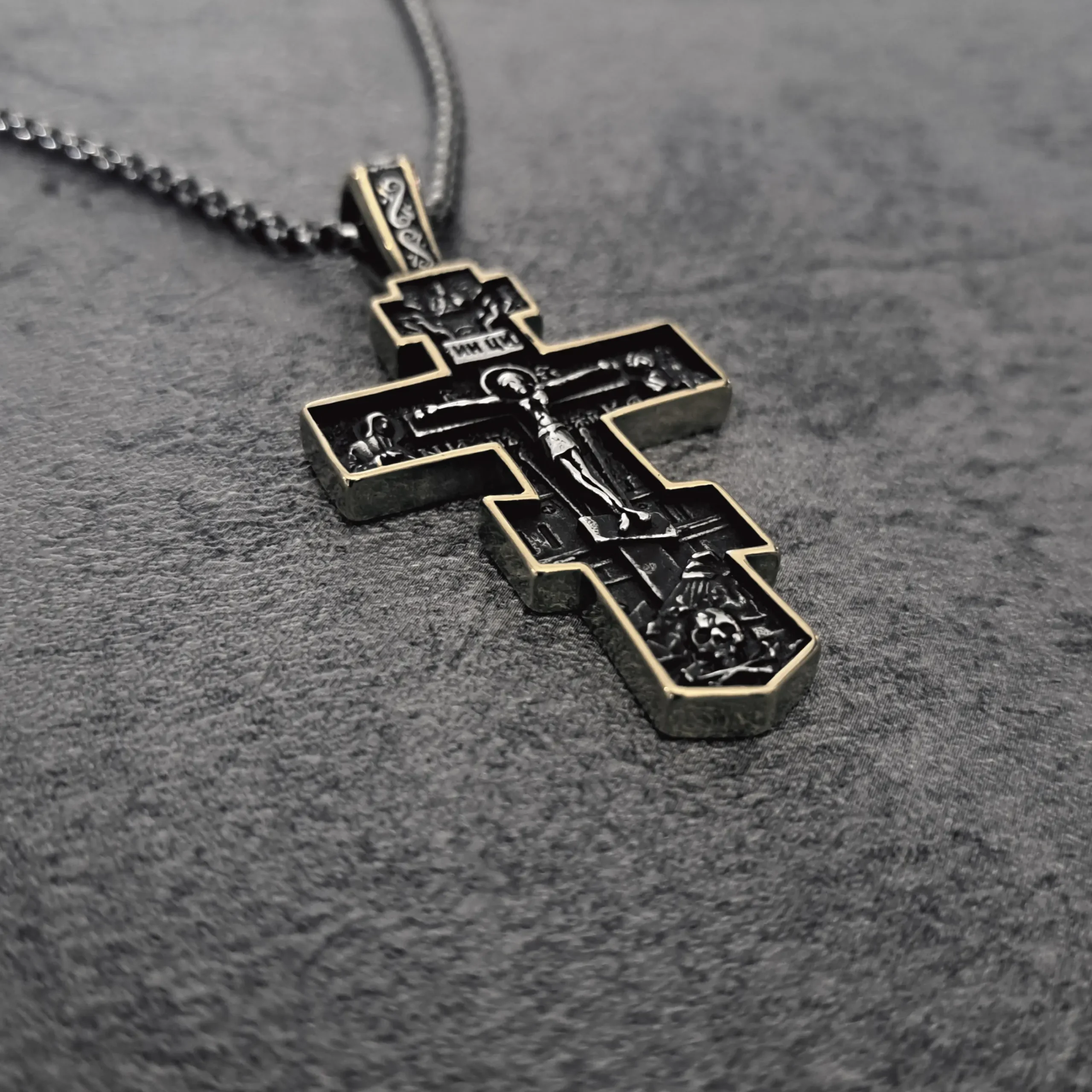 Dark Faith Orthodox Cross – Two Tone Stainless Steel Biker Pendant | RatRyder 2 Angled close-up of heavy-duty stainless steel biker jewellery cross pendant with gold border