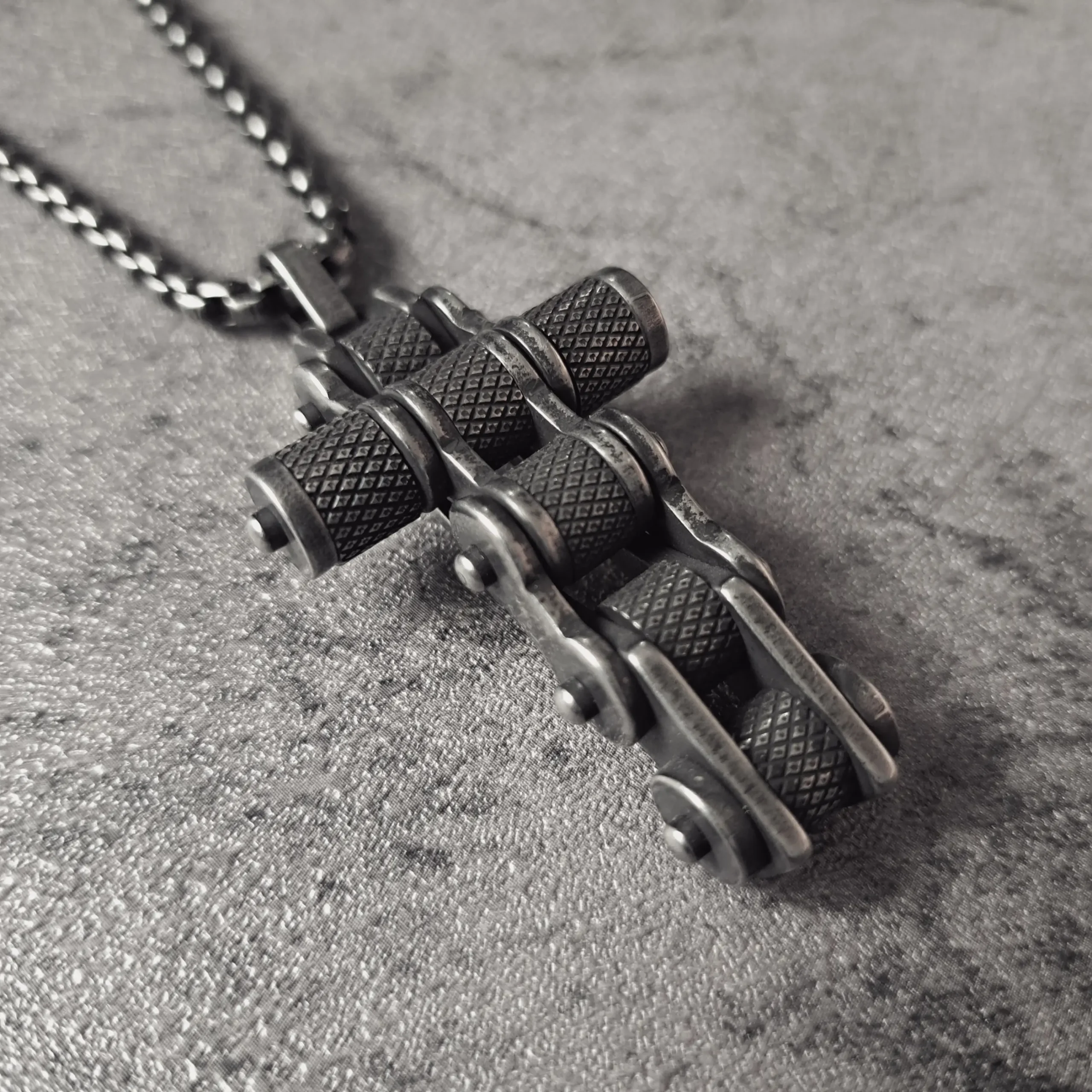 Motorcycle Chain Cross – 316L Stainless Steel Biker Pendant | RatRyder 2 Angled view of motorcycle chain cross stainless steel biker pendant