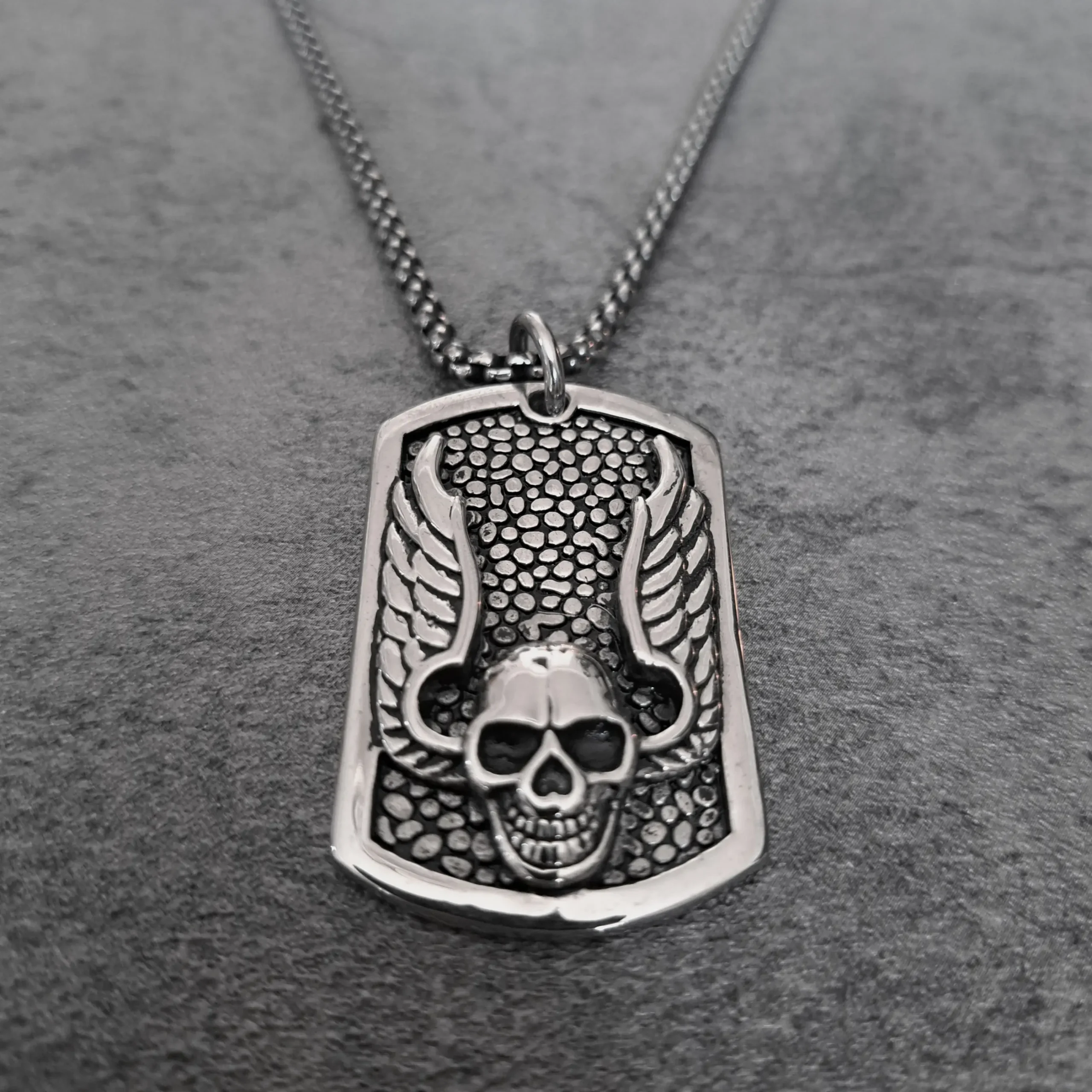 Winged Skull Dog Tag – Heavyweight 316L Stainless Steel Biker Pendant | RatRyder 1 Solid 316L stainless steel winged skull dog tag biker pendant front view