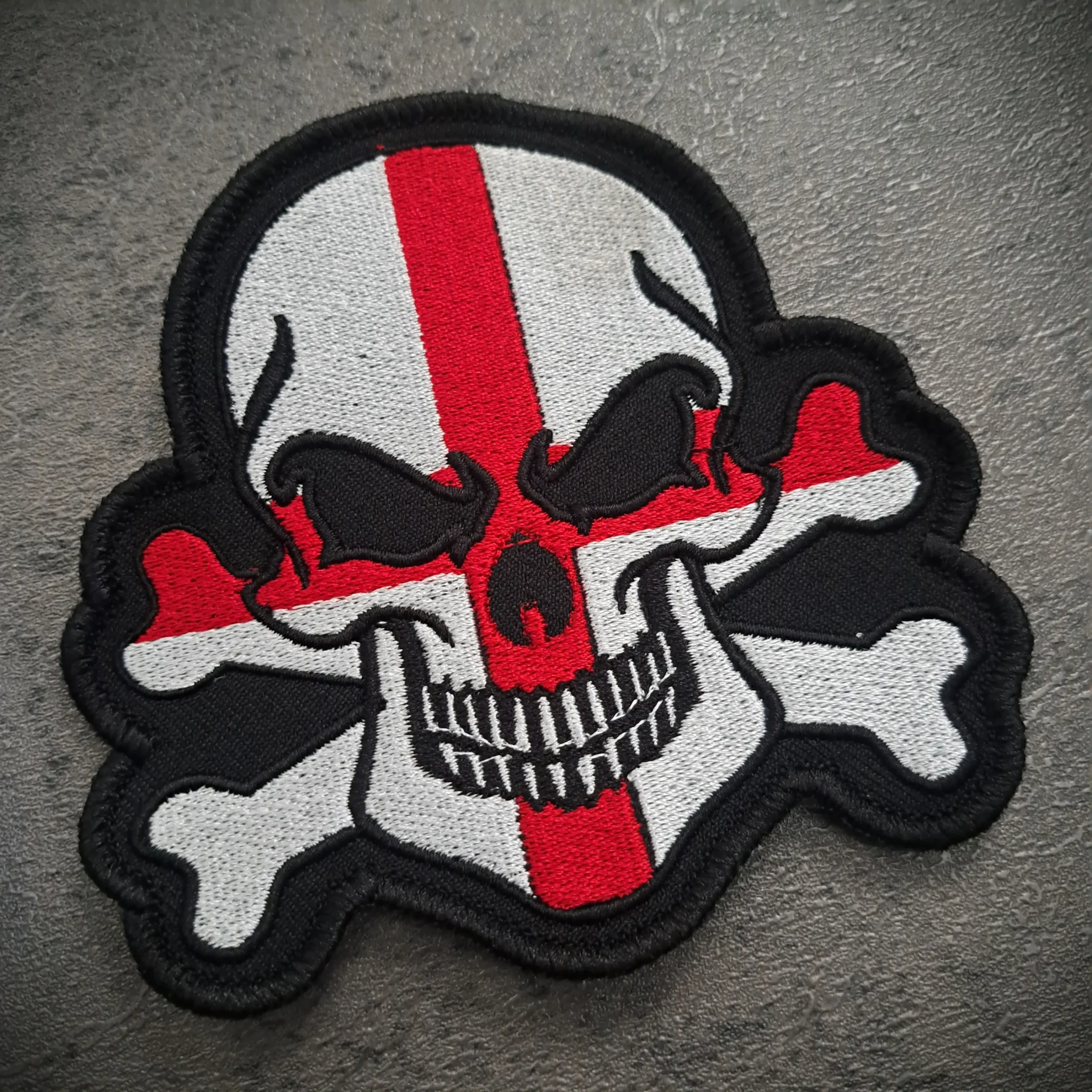 England Skull Flag Biker Patch – Sew On | Rat-Ryder 2 Angled view of England skull embroidered biker patch showing stitched detail