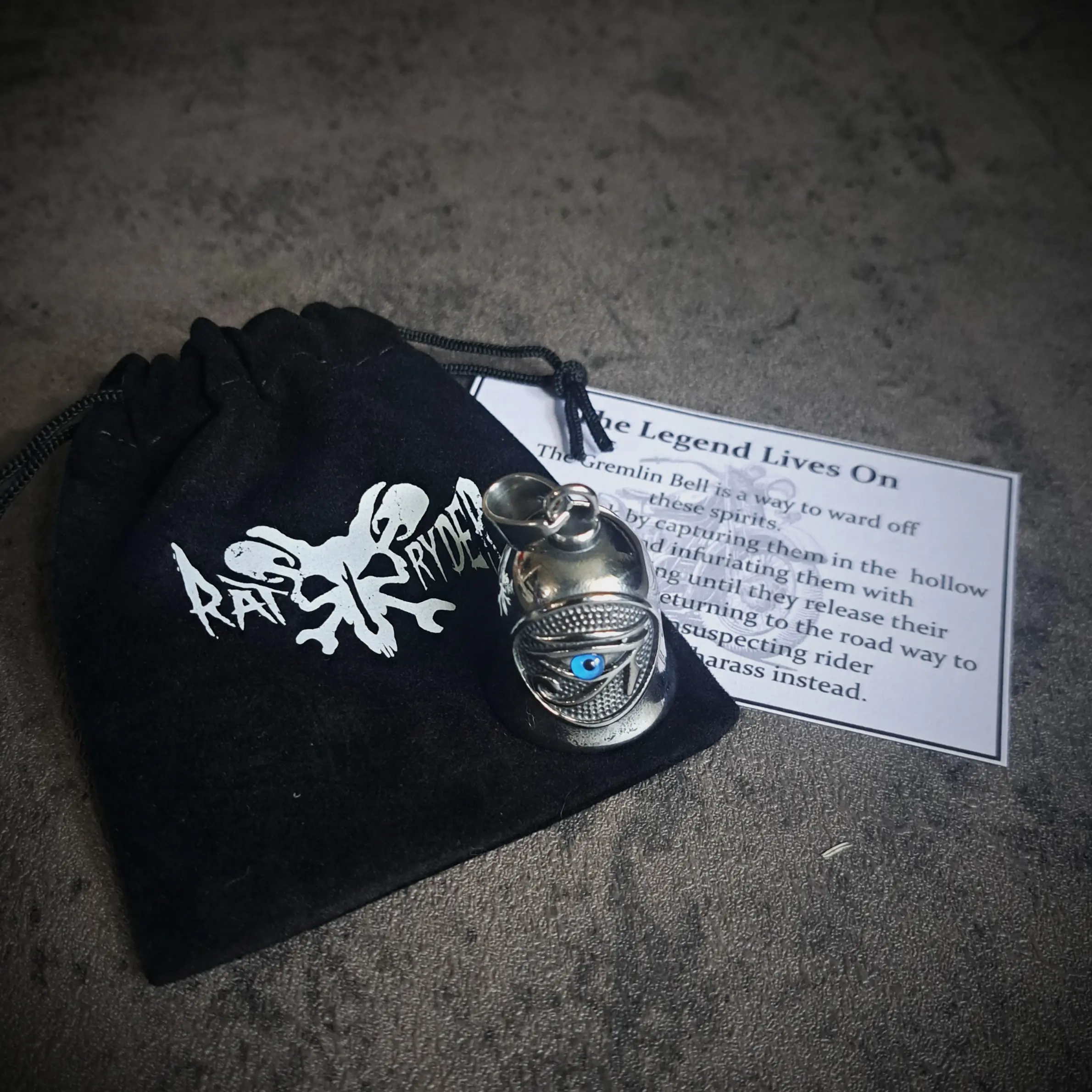 Eye of Horus Guardian Bell – 316L Stainless Steel | Rat-Ryder 3 Eye of Horus Guardian Bell with Rat-Ryder pouch and legend card