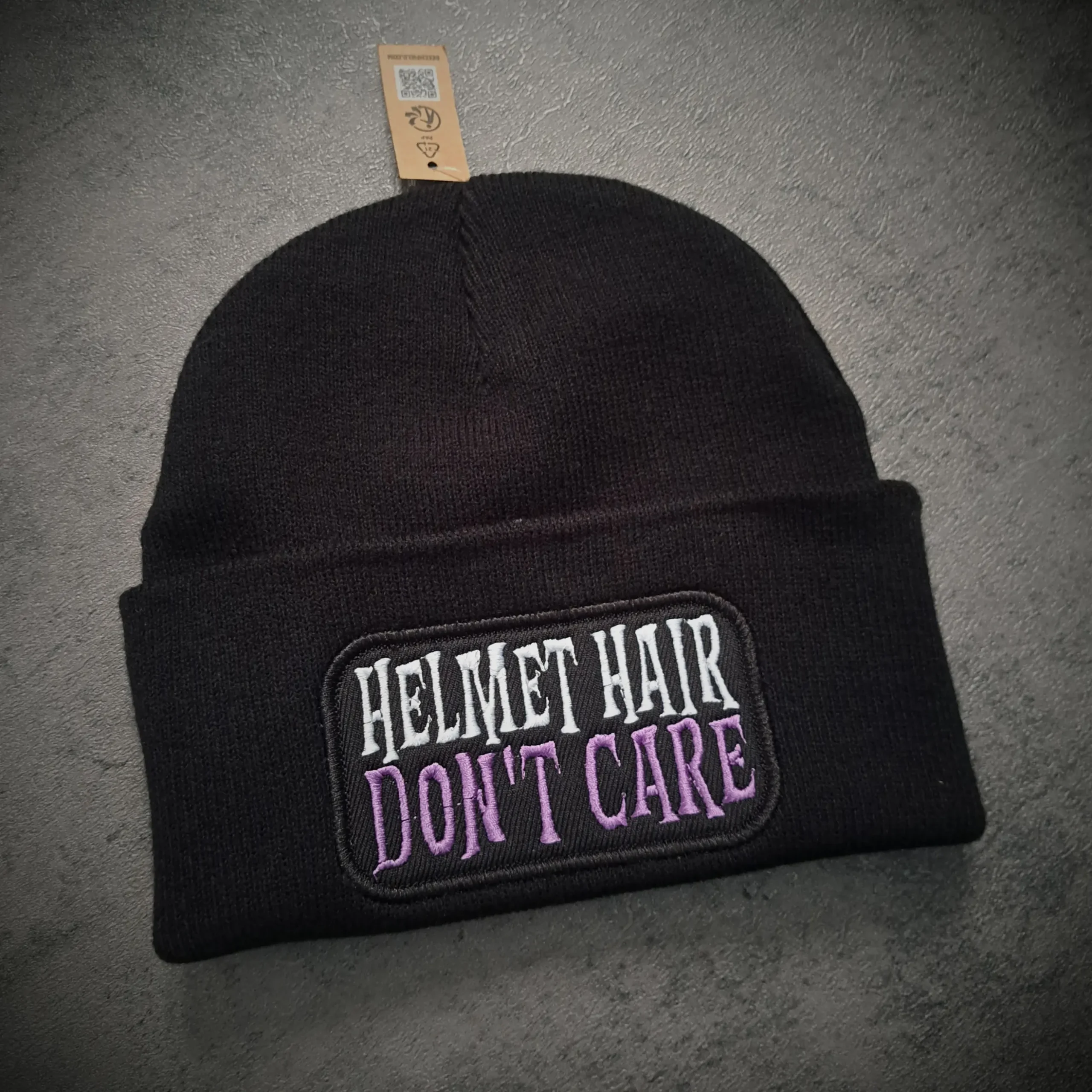 Helmet Hair Don't Care Biker Beanie – Black | Rat-Ryder® 2 Angled view of Helmet Hair Don't Care embroidered black biker beanie